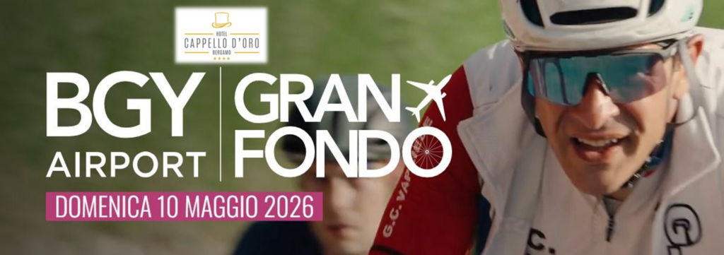 Primo piano di un ciclista con una divisa sportiva e occhiali da sole tecnici e, in sovraimpressione, logo della gara Granfondo BGY Airport